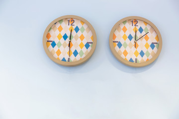 Two colorful clocks