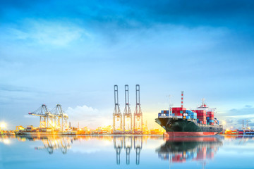 Logistics and transportation of International Container Cargo ship in a harbor with water...