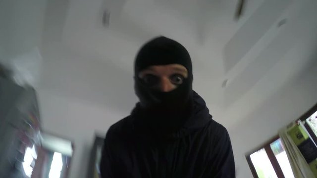Crazy Happy Burglar Running in House During Robbery