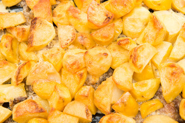 baked potatoes on a baking sheet