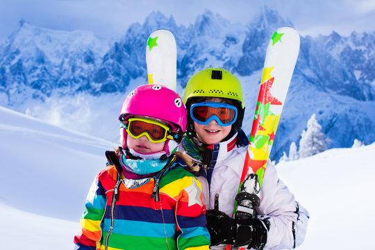 Kids skiing in the mountains