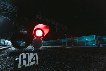 Red semaphore railway night. Photo on long exposure night