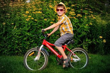 Fototapeta premium kid on a bike