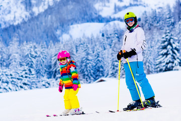 Kids skiing in the mountains