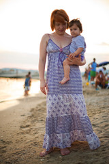  Mother and baby on beach