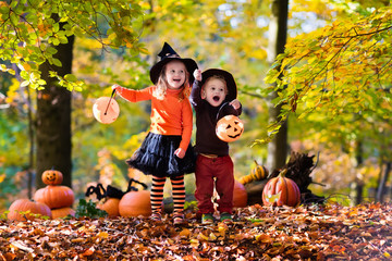 Kids with pumpkins on Halloween