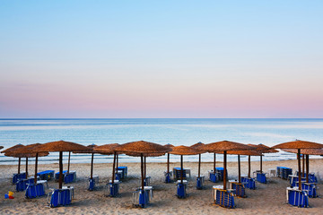 Beach beds and umbrellas
