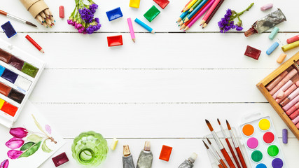 Watercolor paints, brushes for painting, pencils, pastel crayon