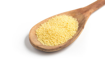 Ground Wheat into a spoon. Trigo para quibe. Kibbeh