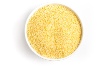 Ground Wheat into a spoon. Trigo para quibe. Kibbeh