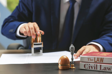 Notary public in office stamping document