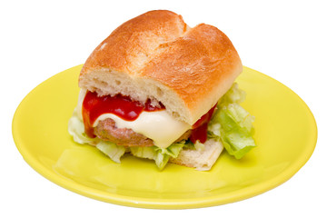 Meatball and cheese sandwich on a white background seen up close