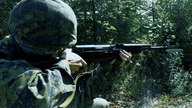 4K Smoke and Recoil from Military Rifle, Soldier Firing Large Gun with Bayonet