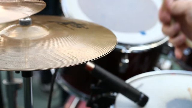 drum kit closeup drummer plays during live performance