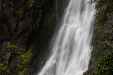 Fototapeta na wymiar Close waterfall rocks.