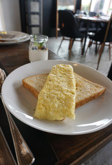 Thin omelette on bread toast