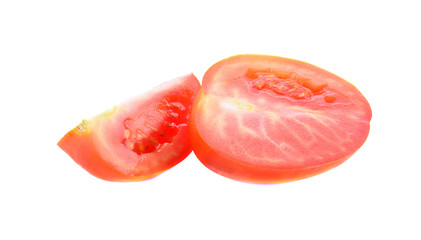 Pieces of tomato isolated on white