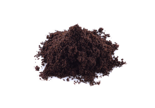 Pile of fresh ground coffee powder isolated on white
