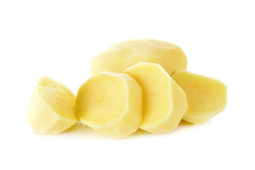 portion cut peeled potato on white background