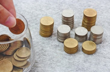 Saving money concept with coin stack growing