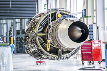 Obraz premium Big airplane engine during maintenance