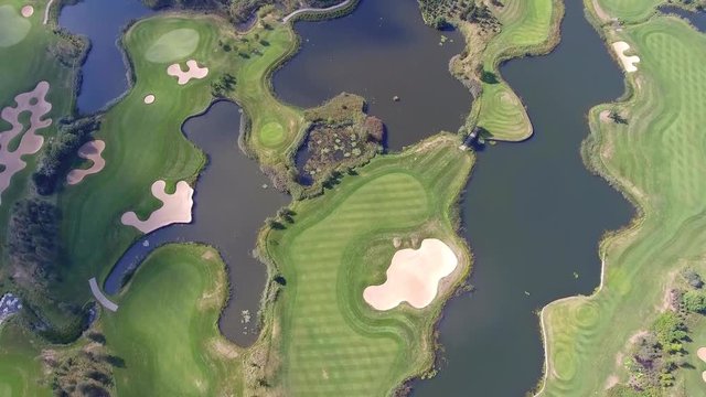 Aerial view over golf field in Poland. Summer time.