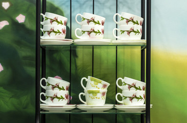 Twelve cups on the two shelf