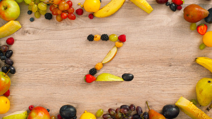 Fruits made letter Z. The letters are made up of fruits. Alphabet on a table. Z