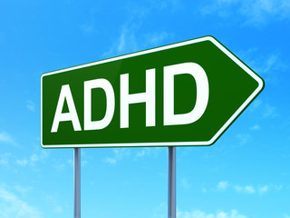 Healthcare concept: ADHD on road sign background