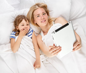 Mother and daughter with tablet