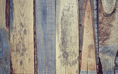 Old wooden rough boards vertically oriented, natural background.