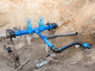 500mm drink water pipes joined with new blue Gate valves and new black waga multi joint members.