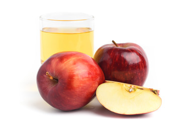 Red apple and juice on white background