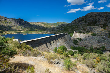 Obraz na płótnie Canvas Collapsed Sanabria dam in Zamora, Spain, wide angle