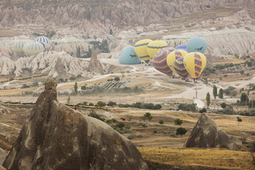 GOREME, TURKEY - AUGUST 28: Hot air balloon fly over Cappadocia