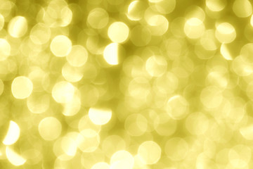 Obraz premium gold abstract background with bokeh defocused lights