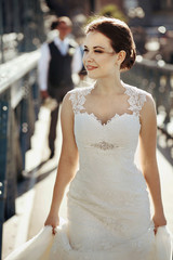 Naklejka premium Happy newlyweds on the street
