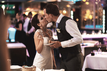 Stylish happy bride and groom