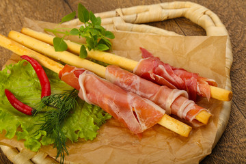 Bread sticks with serrano