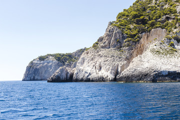 Fototapeta na wymiar Cruise around Zakynthos, views from the sea on the island, Greece, background.