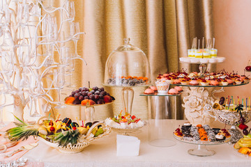 Delicious wedding reception candy bar dessert table
