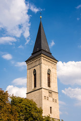 Fototapeta na wymiar Church tower of Church of Our Lady Na Náměti in Kutná Hora.