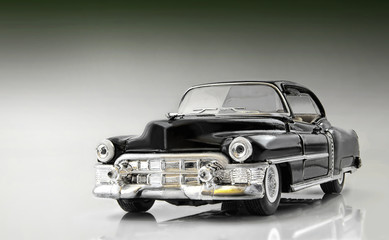 The toy car on a gradient background.