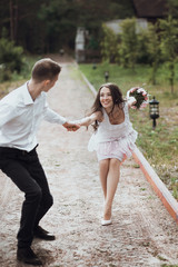 Fototapeta premium Couple of newlyweds in the park