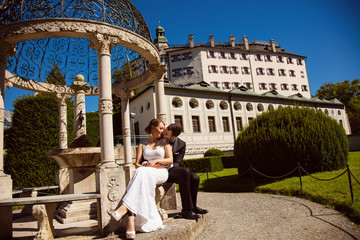 Obraz premium Happy couple beautiful groom and bride on their wedding day