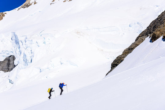 Ice Climbing on glacier in the mountains of Switzerland - Aletsch Glacier