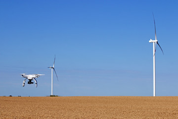 drone flying over wheat field