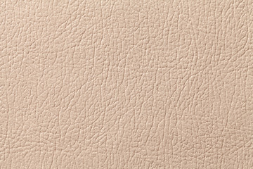 Beige leather texture background with pattern, closeup.