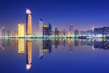 Fototapeta na wymiar Skyline of Abu Dhabi at night, United Arab Emirates