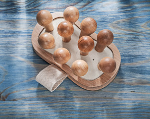 Wooden massager on wood board healthcare concept